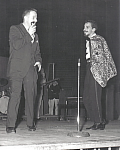 Adam onstage in 1962 at WINN emcee event